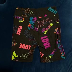 Peace black biker shorts with pink and rainbow writing